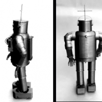 1932. Japanese engineer Yasutaro Mitsui with his steel humanoid, Tokyo, Japan.