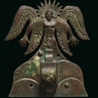 Aplikacja z brązu przedstawiająca boga słońca Usila, Etrusków, 500-475 pne.