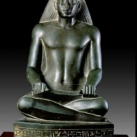 In this well modeled and polished statue, the vizier Nespaqashuty is depicted as a scribe.