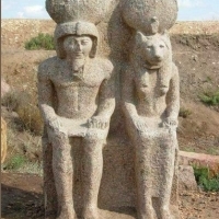 Red granite double statue of pharaoh Ramesses II and the fearsome goddess Sekhmet.