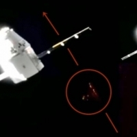 Triangular Craft filmed during docking procedure SpaceX Dragon Capsule and the ISS?
